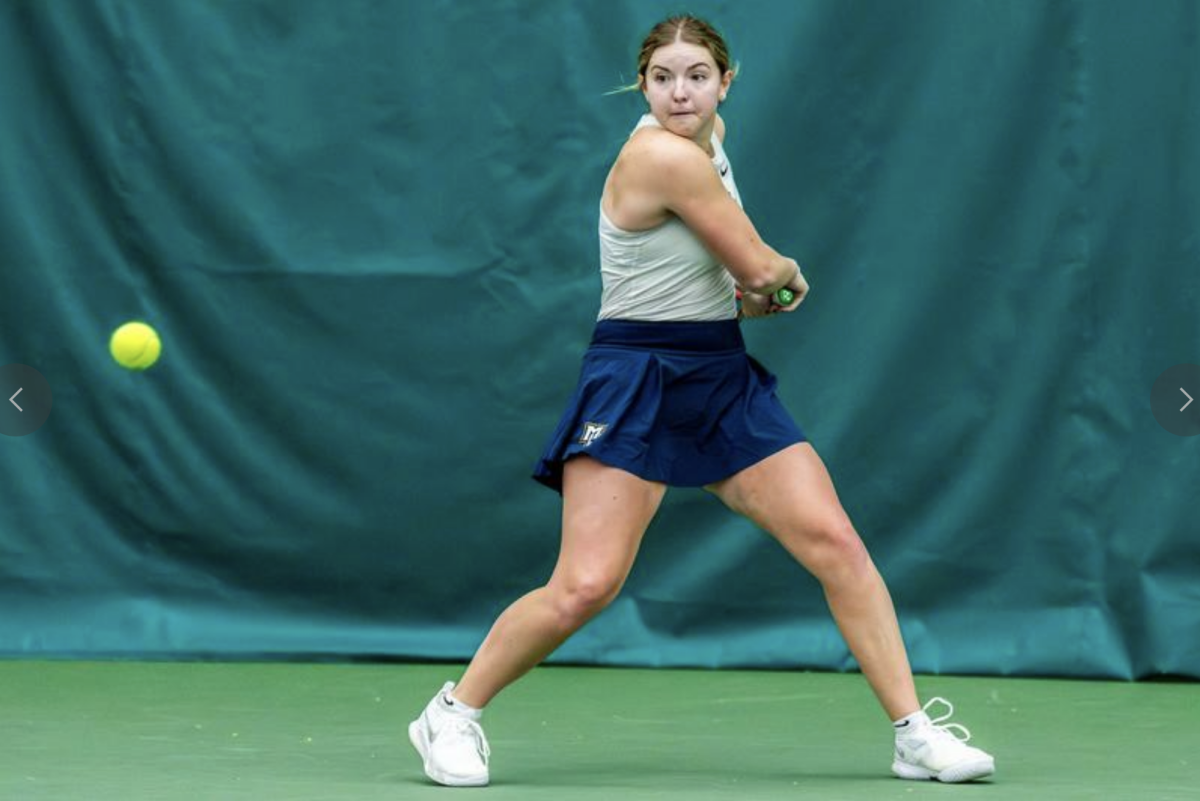 Junior Emma Davis won at the No. 3 spot in singles play to clinch Marquette's 4-0 victory over Bradley Feb. 15. (Photo courtesy of Marquette Athletics.)